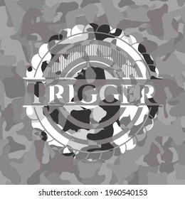 Trigger auf grauer Camo-Textur 
