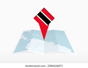 Trinidad and Tobago is depicted on a folded paper map and pinned location marker with flag of Trinidad and Tobago. Folded vector map.