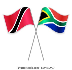 Trinidadian and South African crossed flags. Trinidad and Tobago combined with South Africa isolated on white. Language learning, international business or travel concept.