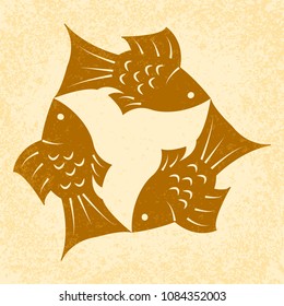 Trinity Sunday. The concept of a religious Christian holiday. Three fish, located symmetrically. On a Beige grunge background