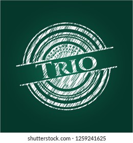 Trio chalkboard emblem written on a blackboard