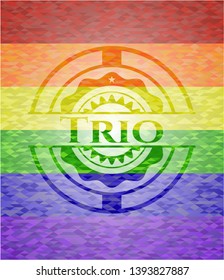 Trio on mosaic background with the colors of the LGBT flag