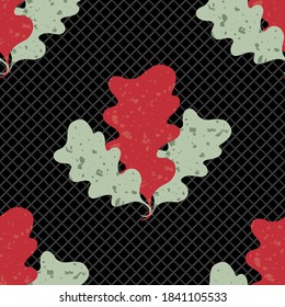 Trios of green red oak leaves seamless vector pattern background. Hand drawn forest foliage silhouettes with flecked texture on grid black backdrop. Mid-century botanical all over print for fall