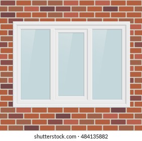 Triple metal plastic window in brick wall