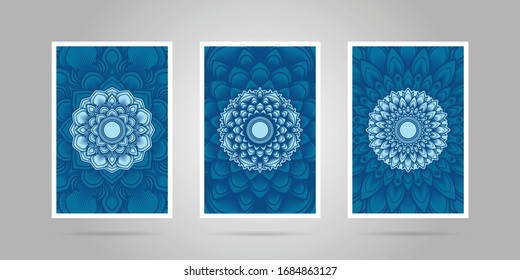 Triple poster or wall decoration set of mandala flower ornament in classc blue color gradient. Suitable for yoga room decoration. Colorful Indian mandala ornament set.