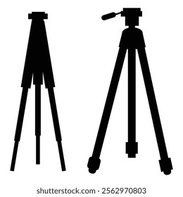 Tripod with Photo Camera Silhouette Against Sunset