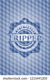 Tripper blue emblem with geometric pattern.