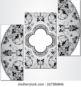 Triptych artwork with a round ornament with a flowers.