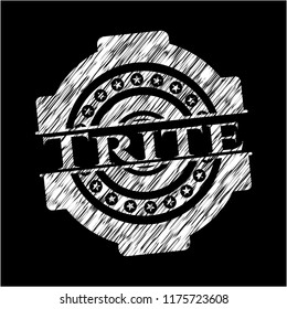 Trite written on a chalkboard