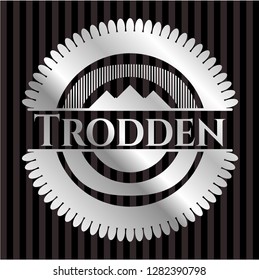 Trodden silvery shiny badge
