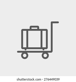 Trolley luggage icon thin line for web and mobile, modern minimalistic flat design. Vector dark grey icon on light grey background.
