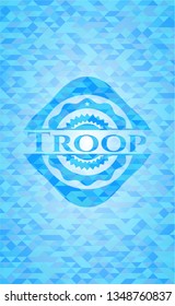 Troop light blue emblem. Mosaic background