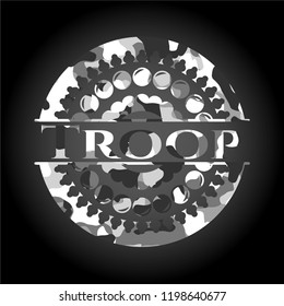 Troop on grey camouflage texture