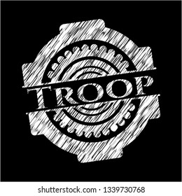 Troop written on a blackboard