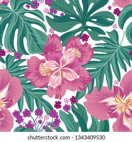 Tropcal flowers and palm leaves seamless pattern. Beautiful floral background. Summer nature wallpaper.