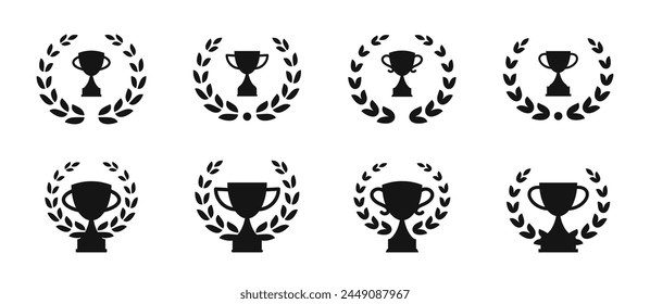 Trophy cup, award with wreath vector icons. Trophy with laurel wreath vector icons. Champion cup winner trophy award vector icon.