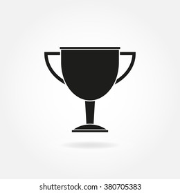 Trophy cup. Vector icon. Award and win icon in flat style.