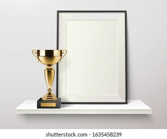 Trophy and frame realistic composition with golden cup and photo frame standing on white wall shelf vector illustration