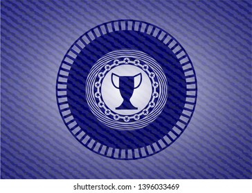 trophy icon inside badge with denim texture