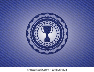 trophy icon inside badge with denim texture