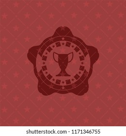 trophy icon inside badge with red background