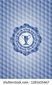 trophy icon inside blue emblem or badge with abstract geometric pattern background.
