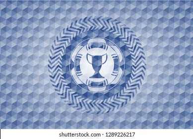 trophy icon inside blue emblem or badge with geometric pattern background.