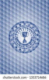 trophy icon inside blue emblem with geometric pattern.