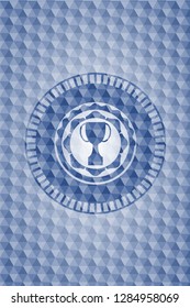trophy icon inside blue polygonal emblem.