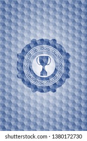trophy icon inside blue polygonal emblem.
