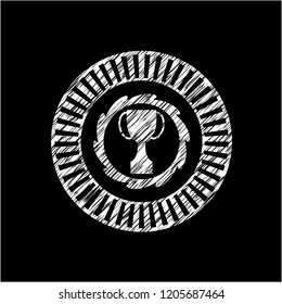 trophy icon inside chalk emblem written on a blackboard