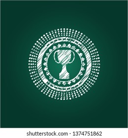 trophy icon inside chalk emblem written on a blackboard