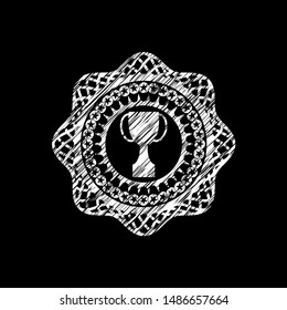 trophy icon inside chalk emblem written on a blackboard
