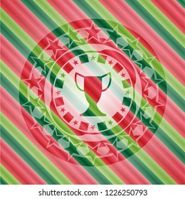 trophy icon inside christmas colors emblem.