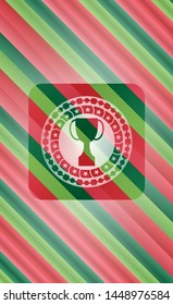 trophy icon inside christmas colors style badge.