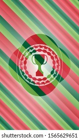 trophy icon inside christmas colors style badge.