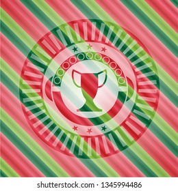 trophy icon inside christmas emblem.