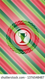 trophy icon inside christmas emblem.