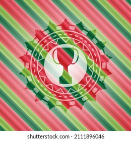 ícono de trofeo dentro del emblema de navidad. 