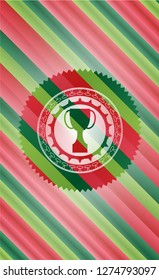 trophy icon inside christmas style badge..