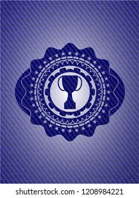 trophy icon inside emblem with denim texture
