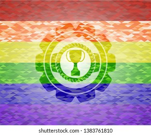 trophy icon inside emblem on mosaic background with the colors of the LGBT flag