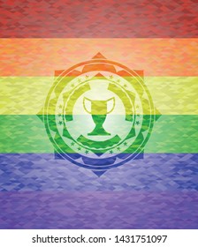 trophy icon inside emblem on mosaic background with the colors of the LGBT flag
