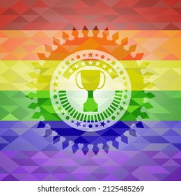 trophy icon inside emblem on mosaic background with the colors of the LGBT flag. 