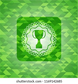 trophy icon inside green emblem with mosaic background