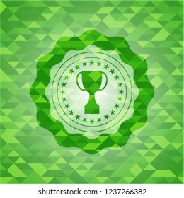 trophy icon inside green emblem with mosaic ecological style background