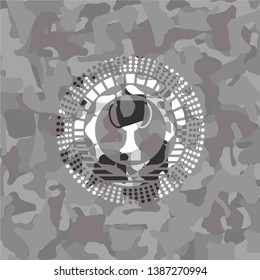 trophy icon inside grey camo emblem