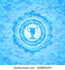 trophy icon inside light blue mosaic emblem. 