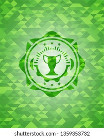 trophy icon inside realistic green mosaic emblem