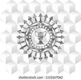 trophy icon inside realistic grey emblem with geometric cube white background